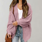 Oversized chunky knit cardigan with balloon sleeves, featuring a soft open front design, perfect for women's layering in cool weather. 3