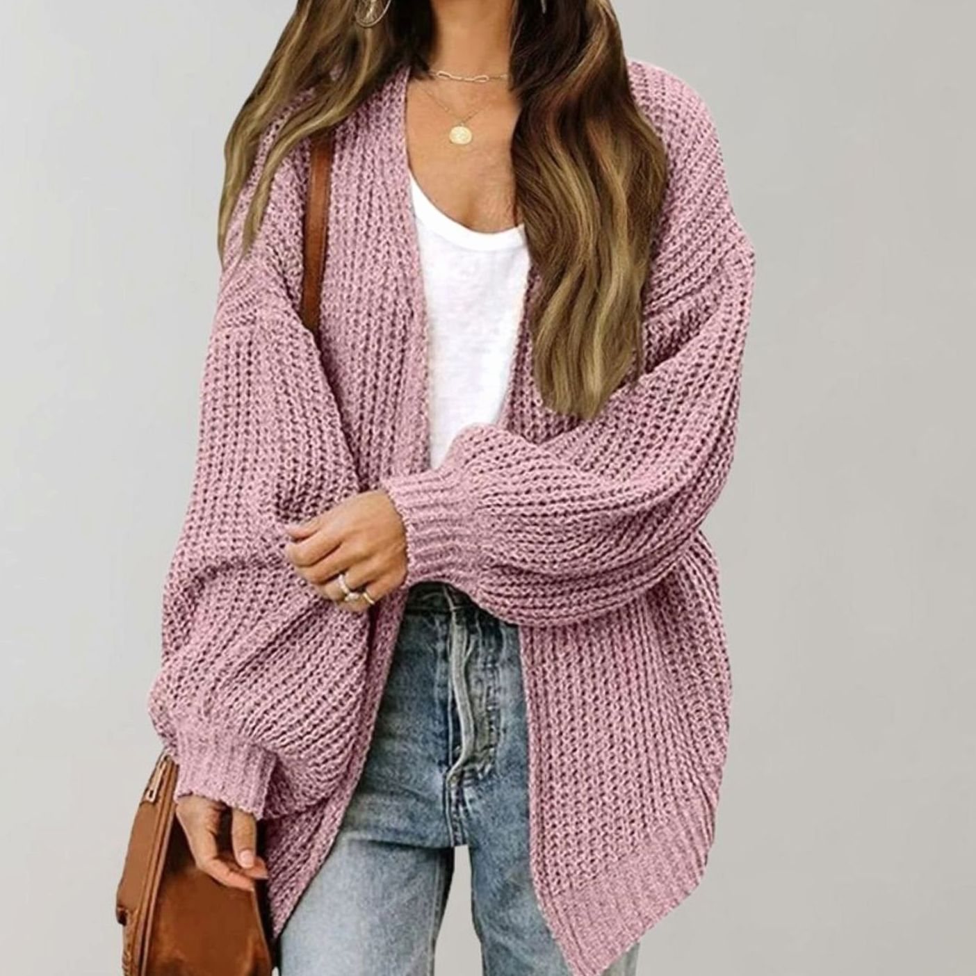 Oversized chunky knit cardigan with balloon sleeves, featuring a soft open front design, perfect for women's layering in cool weather. 3