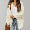 Oversized chunky knit cardigan with balloon sleeves, featuring a soft open front design, perfect for women's layering in cool weather. 4