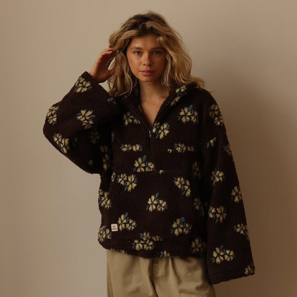 Oversized floral teddy fleece jacket with half zip featuring a retro daisy print and cozy texture, perfect for stylish warmth and comfort. 8