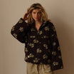 Oversized floral teddy fleece jacket with half zip featuring a retro daisy print and cozy texture, perfect for stylish warmth and comfort. 8