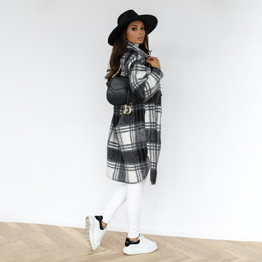 Oversized plaid shacket featuring a button front and chest pockets, designed for women, perfect for casual layering in a wool-style fabric. 4
