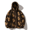 Oversized Sherpa jacket featuring a whimsical teddy bear print and an attached hood, perfect for cozy casual wear in cold weather. 0