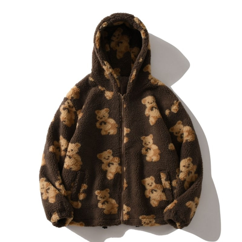 Oversized Sherpa jacket featuring a whimsical teddy bear print and an attached hood, perfect for cozy casual wear in cold weather. 0