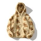 Oversized Sherpa jacket featuring a whimsical teddy bear print and an attached hood, perfect for cozy casual wear in cold weather. 2