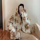 Oversized Sherpa jacket featuring a whimsical teddy bear print and an attached hood, perfect for cozy casual wear in cold weather. 3