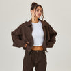 Oversized suede-style bomber jacket for women featuring a zip front and drop shoulders, perfect for casual fashion outerwear. 0