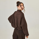 Oversized suede-style bomber jacket for women featuring a zip front and drop shoulders, perfect for casual fashion outerwear. 1
