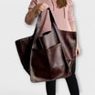 Oversized weekend bag in durable PU leather featuring a versatile design, perfect for stylish travel as a shoulder bag for women. 8