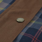 Plaid jacket featuring a corduroy collar and snap buttons, designed with a relaxed fit and hip length, showcasing a stylish tartan check print. 3