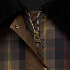 Plaid jacket featuring a corduroy collar and snap buttons, designed with a relaxed fit and hip length, showcasing a stylish tartan check print. 4