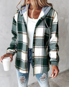 Plaid shacket for women featuring an attached drawstring hood and relaxed fit, perfect for casual layering in stylish autumn outfits. 0