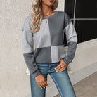 Relaxed sweatshirt featuring textured quilted fabric and a stylish color block check pattern, perfect for casual everyday wear. 0