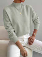 Roll neck jumper featuring a stylish turtleneck design, crafted from soft warm fabric, perfect for cozy autumn wear. 0