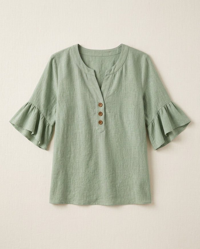 Ruffle blouse with V-neckline and decorative buttons, showcasing a feminine elegant design in soft fabric, perfect for stylish casual or formal wear. 0