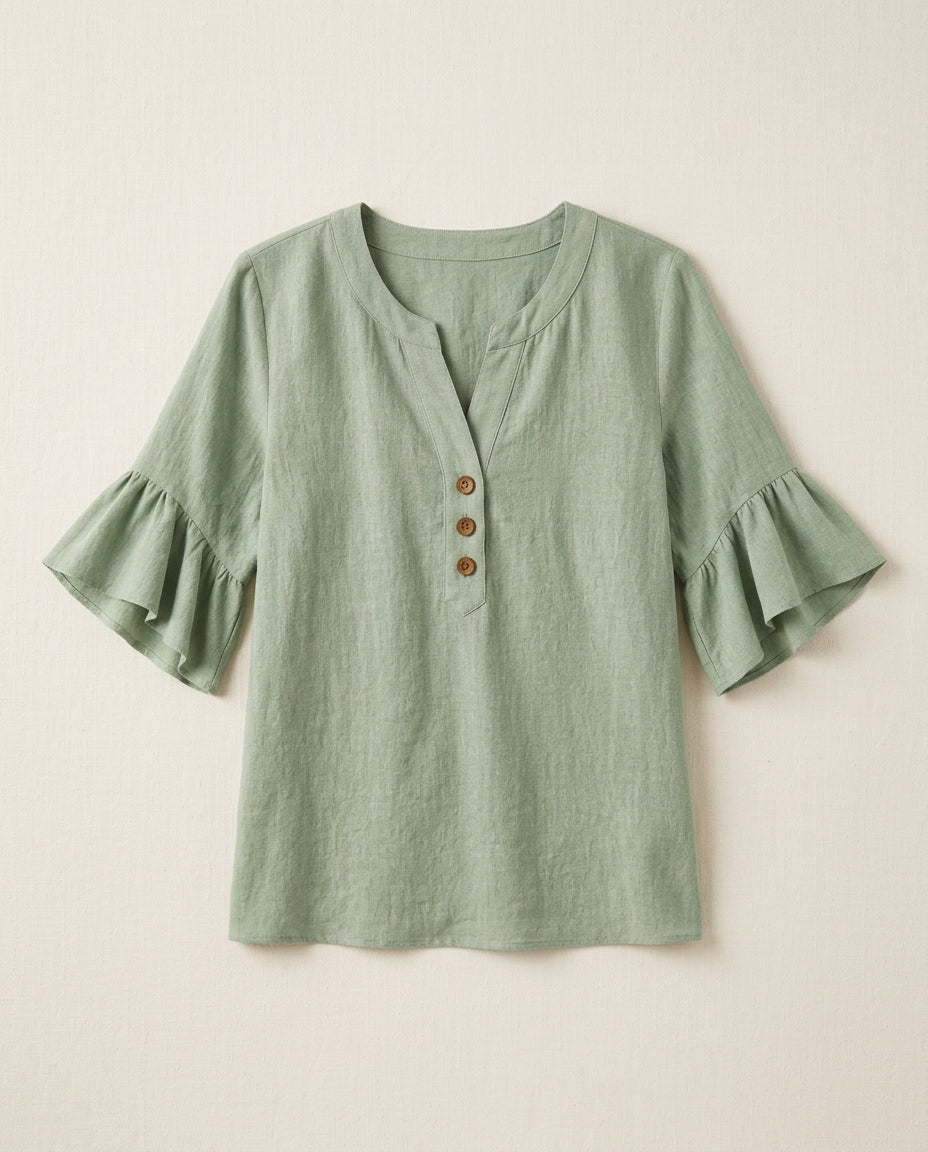 Ruffle blouse with V-neckline and decorative buttons, showcasing a feminine elegant design in soft fabric, perfect for stylish casual or formal wear. 0