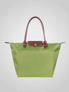 Elegant women's shoulder bag made of high-quality synthetic leather, featuring a spacious interior for everyday essentials and a chic design perfect for any occasion. 7