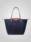 Elegant women's shoulder bag made of high-quality synthetic leather, featuring a spacious interior for everyday essentials and a chic design perfect for any occasion. 8
