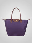 Elegant women's shoulder bag made of high-quality synthetic leather, featuring a spacious interior for everyday essentials and a chic design perfect for any occasion. 9