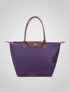 Elegant women's shoulder bag made of high-quality synthetic leather, featuring a spacious interior for everyday essentials and a chic design perfect for any occasion. 9