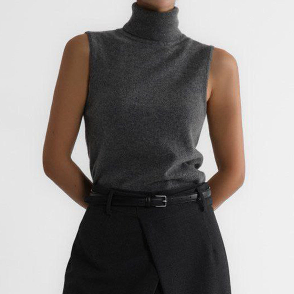 Sleeveless knit top for women featuring a soft turtleneck design and ribbed hem, perfect for layering or wearing alone. 5