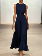 Sleeveless maxi dress featuring a ruched bodice and a flowing A-line skirt, perfect for elegant occasions and casual outings for women. 5
