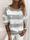 Striped sweatshirt featuring a star print, designed with a relaxed fit and made from soft jersey fabric, perfect for casual wear. 0
