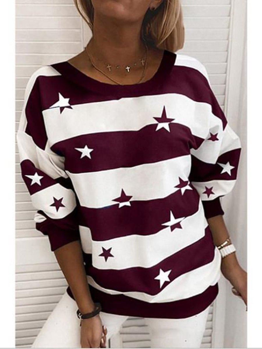Striped sweatshirt featuring a star print, designed with a relaxed fit and made from soft jersey fabric, perfect for casual wear. 1