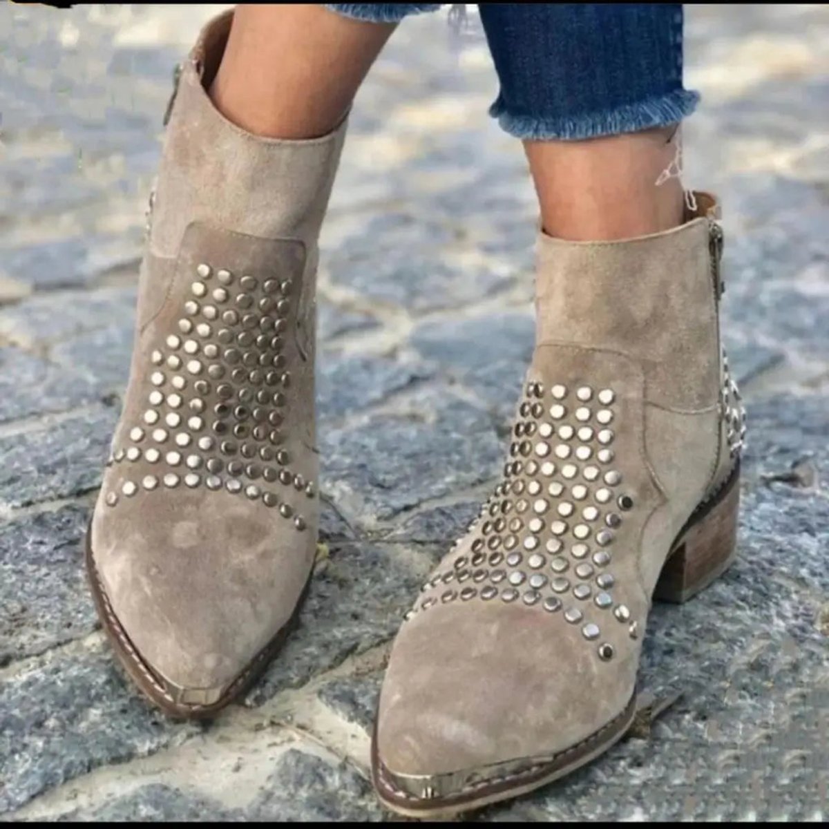 Studded suede ankle boots with side zip closure and pointed toe in taupe, featuring a stylish block heel for a chic look. 0