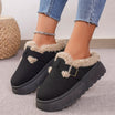 Suede slippers with plush lining and durable sole in brown, black, and white, offering slip-on comfort for indoor use. 3
