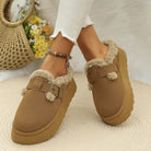 Suede slippers with plush lining and durable sole in brown, black, and white, offering slip-on comfort for indoor use. 7