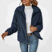 Cozy teddy fleece jacket with zip front and fold-over collar in a relaxed fit cropped style, perfect for layering in cooler weather. 1