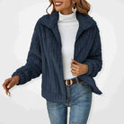 Cozy teddy fleece jacket with zip front and fold-over collar in a relaxed fit cropped style, perfect for layering in cooler weather. 1