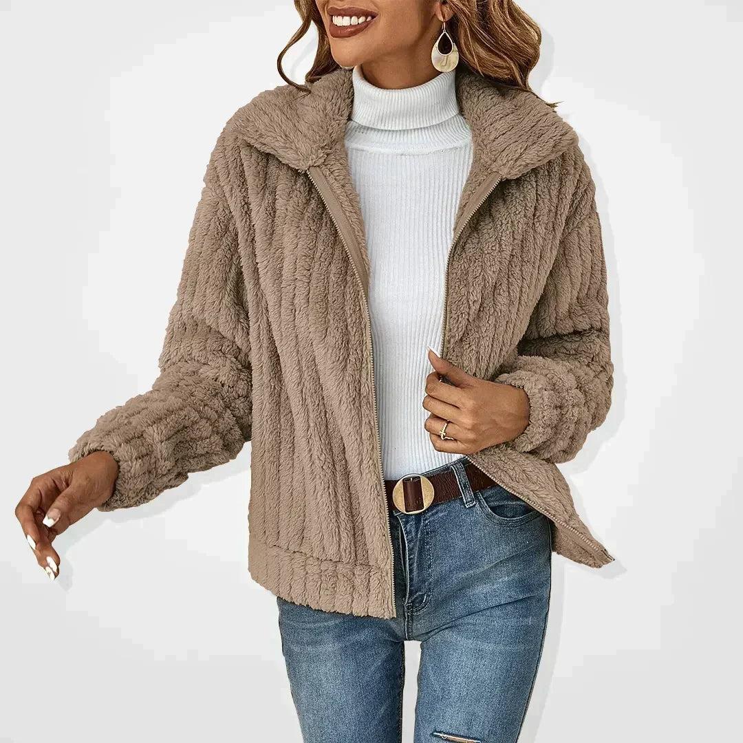 Cozy teddy fleece jacket with zip front and fold-over collar in a relaxed fit cropped style, perfect for layering in cooler weather. 4