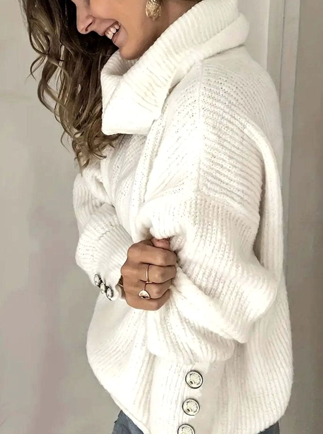 Turtleneck knit sweater with button cuffs in a relaxed fit, perfect for casual everyday wear, featuring a warm and cozy design ideal for fall and winter 1
