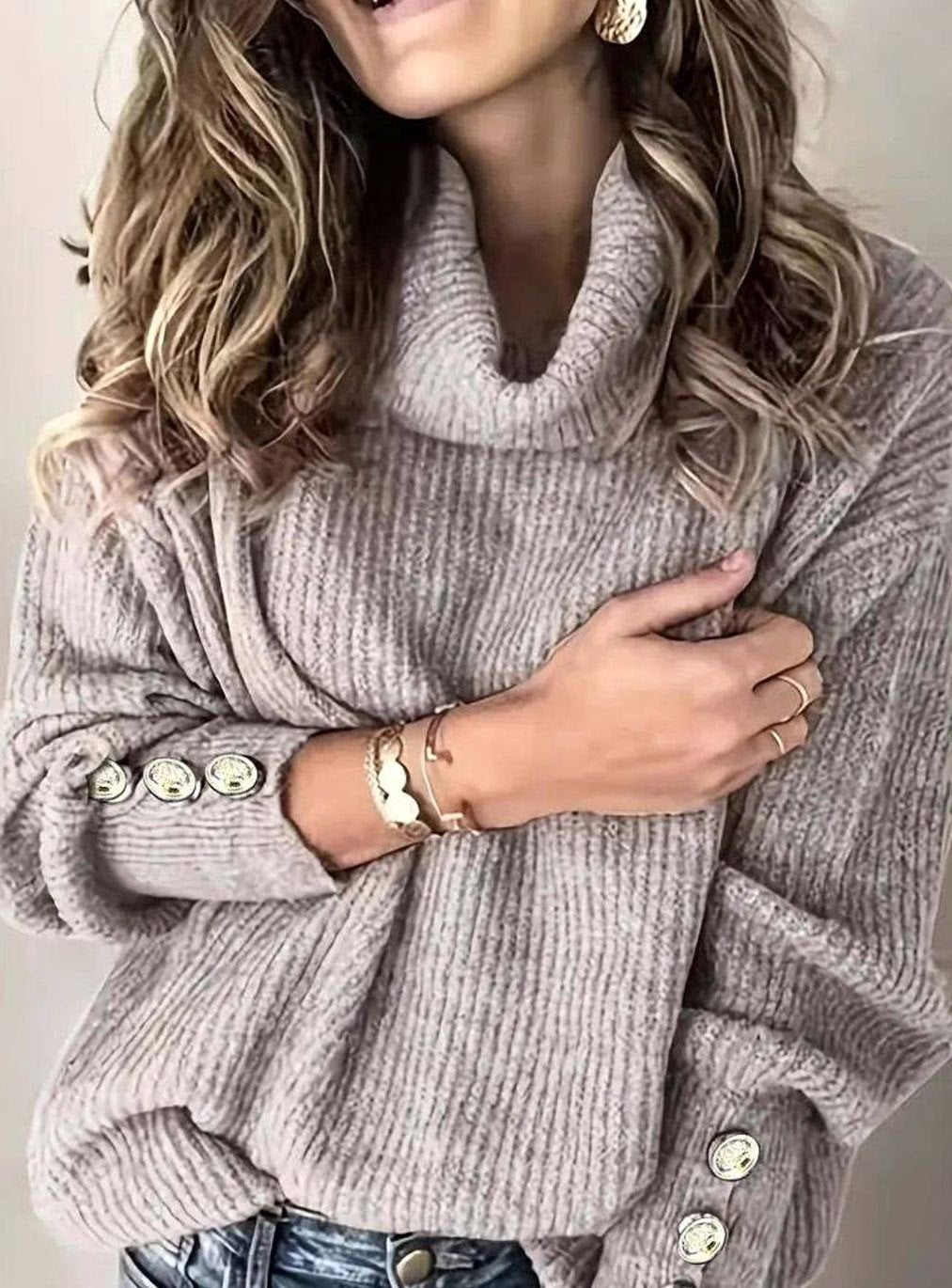 Turtleneck knit sweater with button cuffs in a relaxed fit, perfect for casual everyday wear, featuring a warm and cozy design ideal for fall and winter 2
