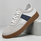 Unisex retro sneakers in cobalt blue featuring a breathable mesh upper and lightweight padded sole for comfort and style. 0
