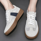 Unisex retro sneakers in cobalt blue featuring a breathable mesh upper and lightweight padded sole for comfort and style. 3