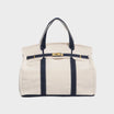 Vintage linen canvas tote bag featuring reinforced handles and a secure snap closure, designed for water resistance and ample space, perfect for everyday use. 0
