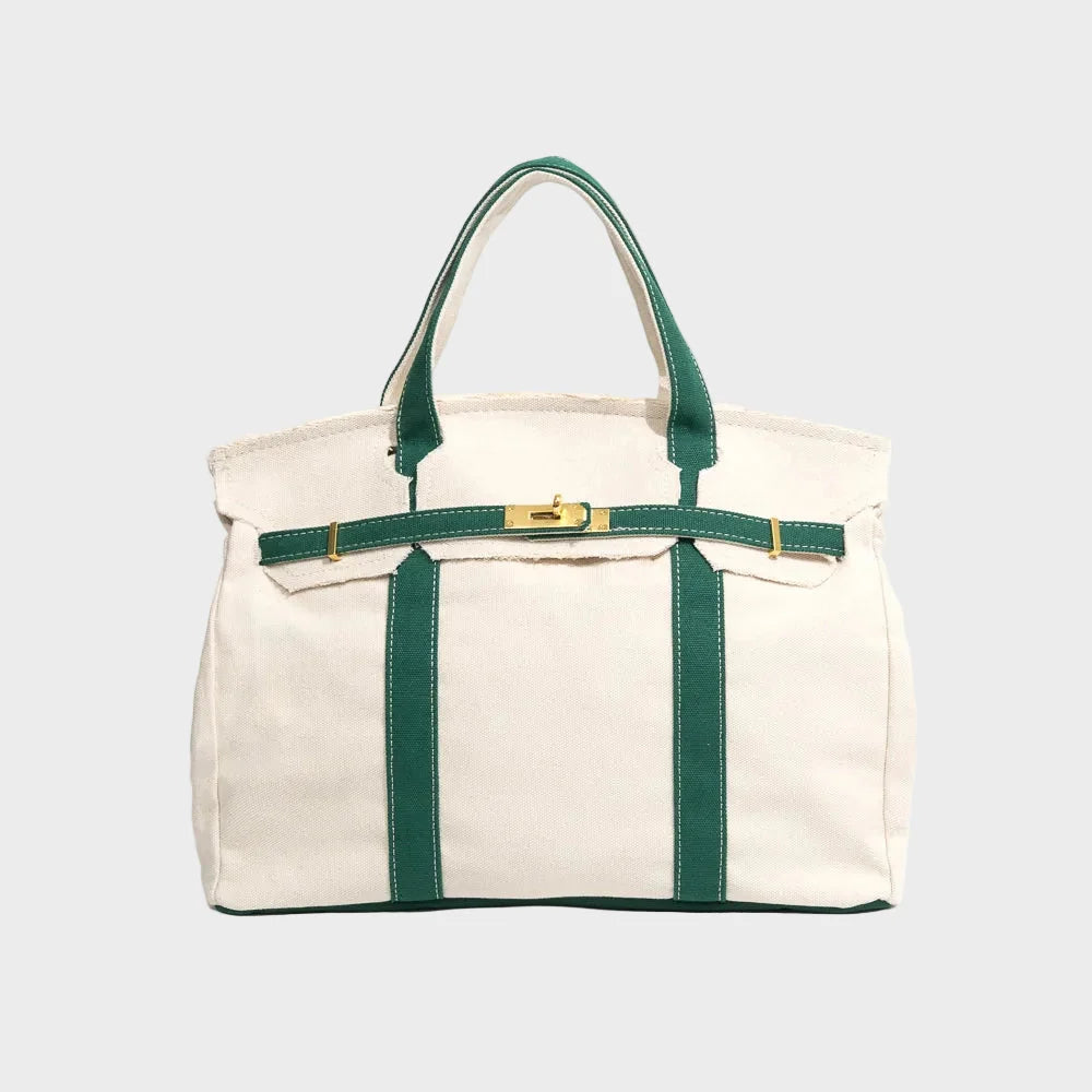 Vintage linen canvas tote bag featuring reinforced handles and a secure snap closure, designed for water resistance and ample space, perfect for everyday use. 1