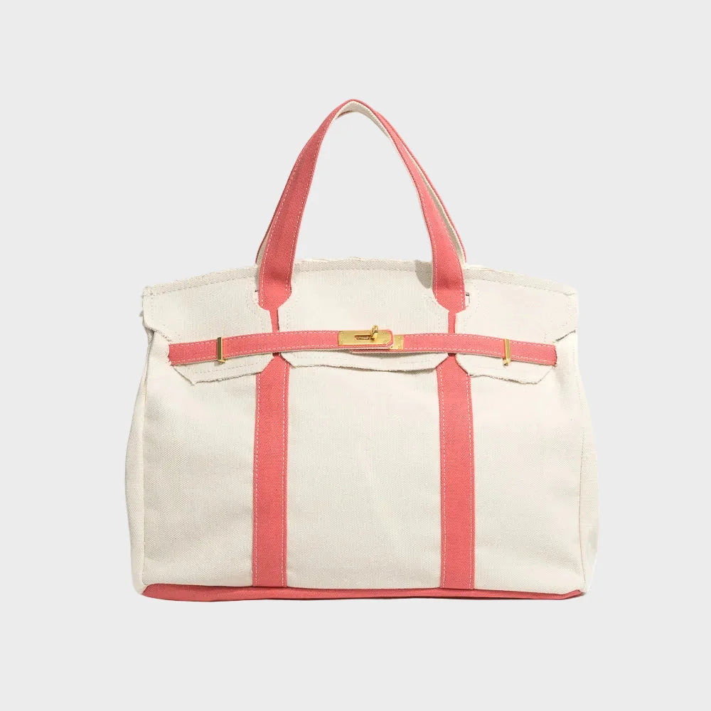 Vintage linen canvas tote bag featuring reinforced handles and a secure snap closure, designed for water resistance and ample space, perfect for everyday use. 2