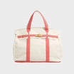 Vintage linen canvas tote bag featuring reinforced handles and a secure snap closure, designed for water resistance and ample space, perfect for everyday use. 2