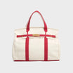 Vintage linen canvas tote bag featuring reinforced handles and a secure snap closure, designed for water resistance and ample space, perfect for everyday use. 3