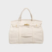 Vintage linen canvas tote bag featuring reinforced handles and a secure snap closure, designed for water resistance and ample space, perfect for everyday use. 5