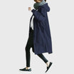 Waterproof trench coat for women featuring a hood and adjustable belt, ideal for stylish protection against rain. 4