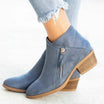 Black suede women's ankle boots featuring a stylish side zipper and a comfortable low block heel, perfect for casual and chic outfits. 1