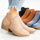 Black suede women's ankle boots featuring a stylish side zipper and a comfortable low block heel, perfect for casual and chic outfits. 2