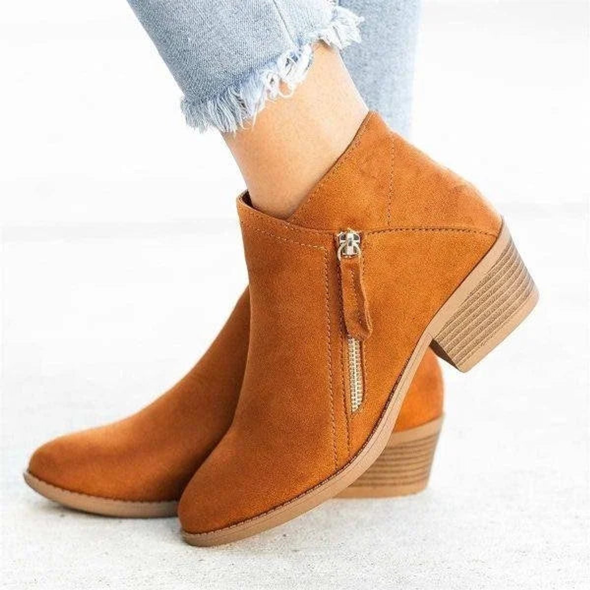 Black suede women's ankle boots featuring a stylish side zipper and a comfortable low block heel, perfect for casual and chic outfits. 4