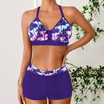 Women's bikini set featuring a stylish V-neck halter top and comfortable swim shorts, made from lightweight polyester and spandex, perfect for beachwear and summer 0
