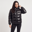 Women's black puffer jacket featuring a stylish attached hood, glossy quilted design, and convenient zip pockets, designed for a relaxed fit perfect for winter wear 0